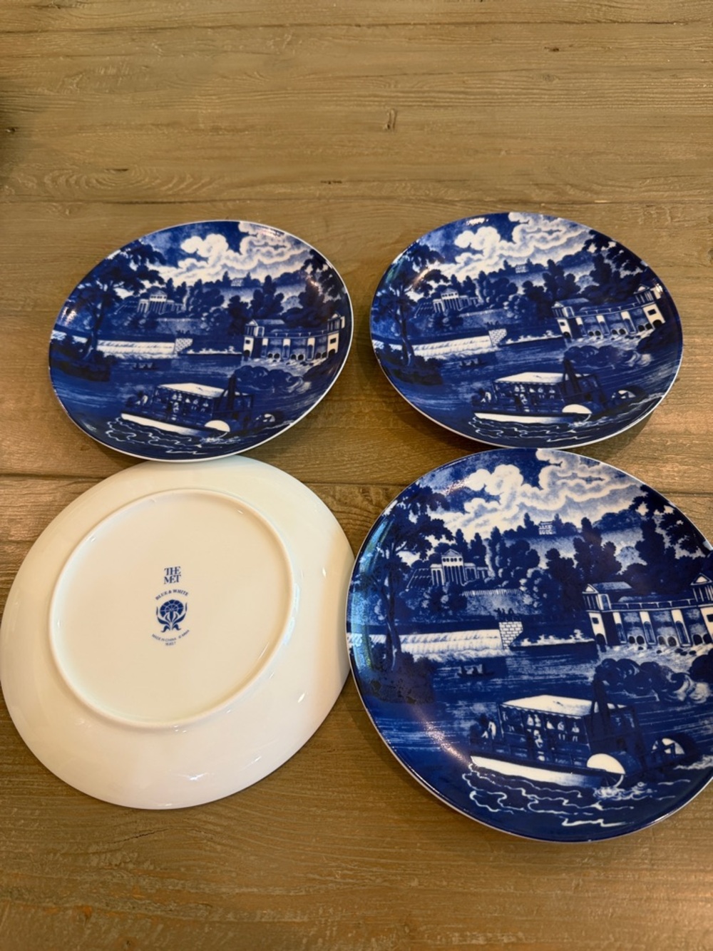 Set of 4 blue/ white collectible plates from “The Met” Museum